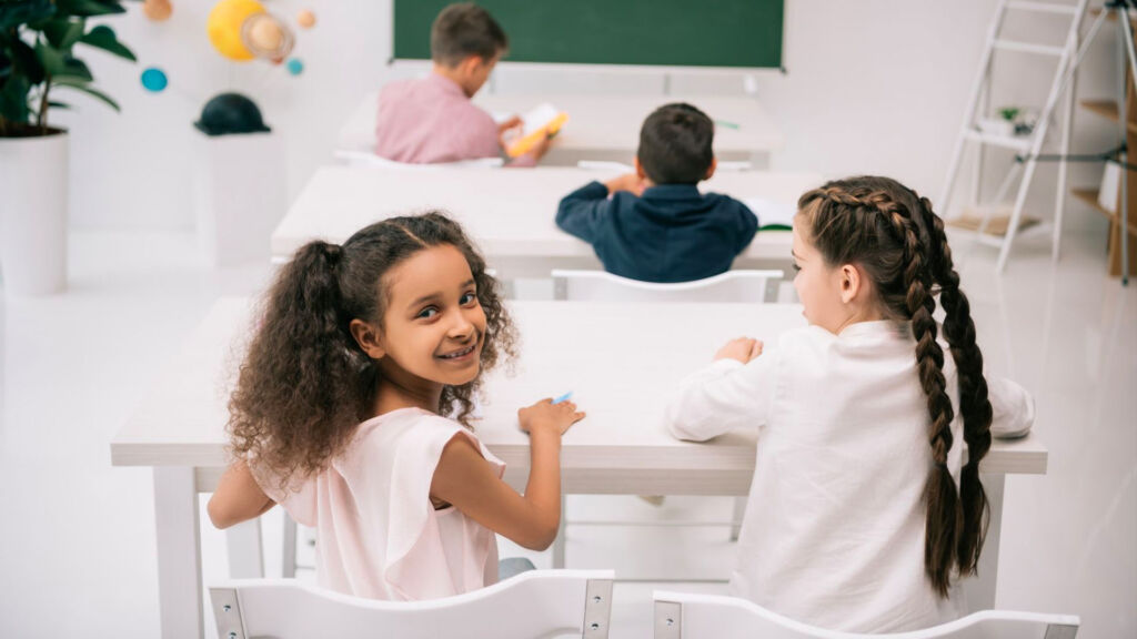 Multiracial students in a classroom.