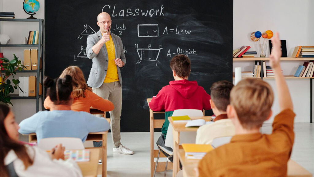 teacher teaching math in the classroom