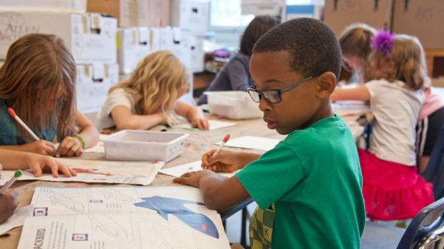 students working at a desk