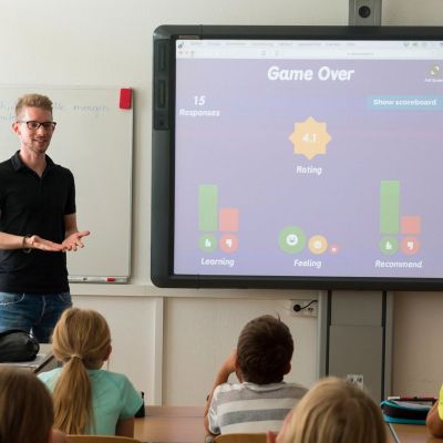 Teacher at the front of the classroom