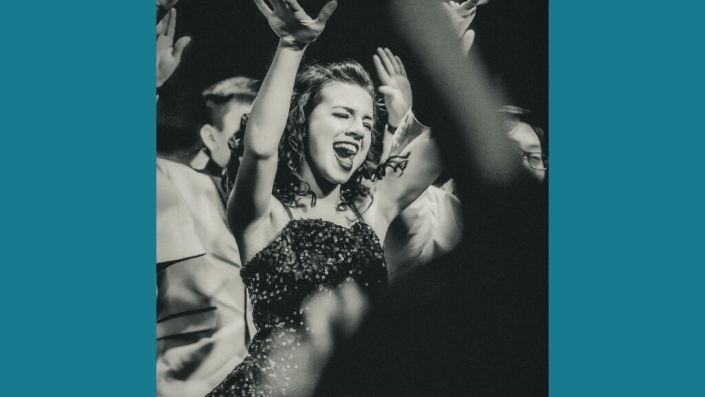 woman dancing in a crowd