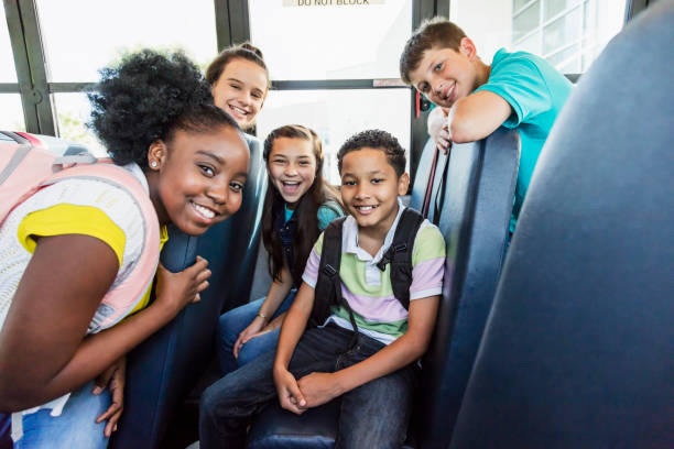 school children on a bus
