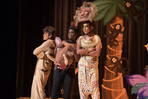 students performing in the Lion King