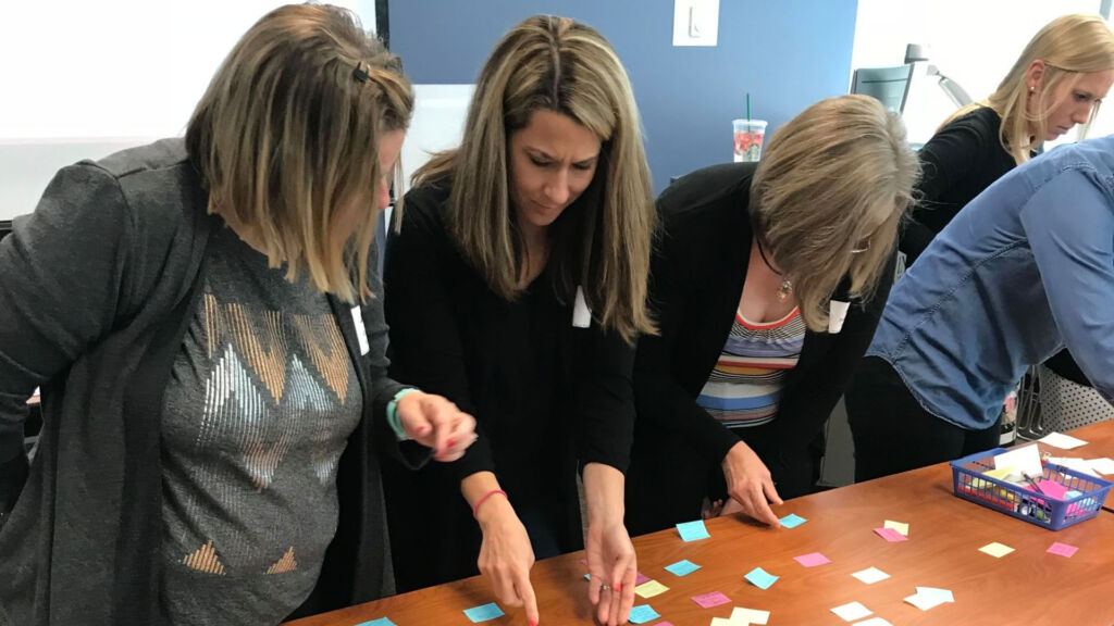 teachers working on a project together