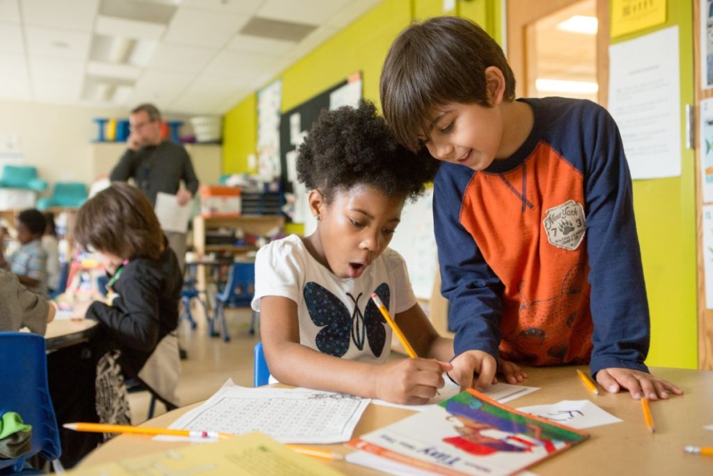 two students working on a math problem