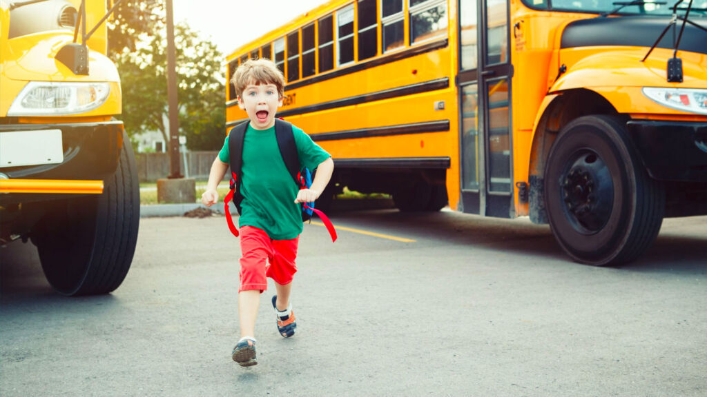 Student running off the bus.