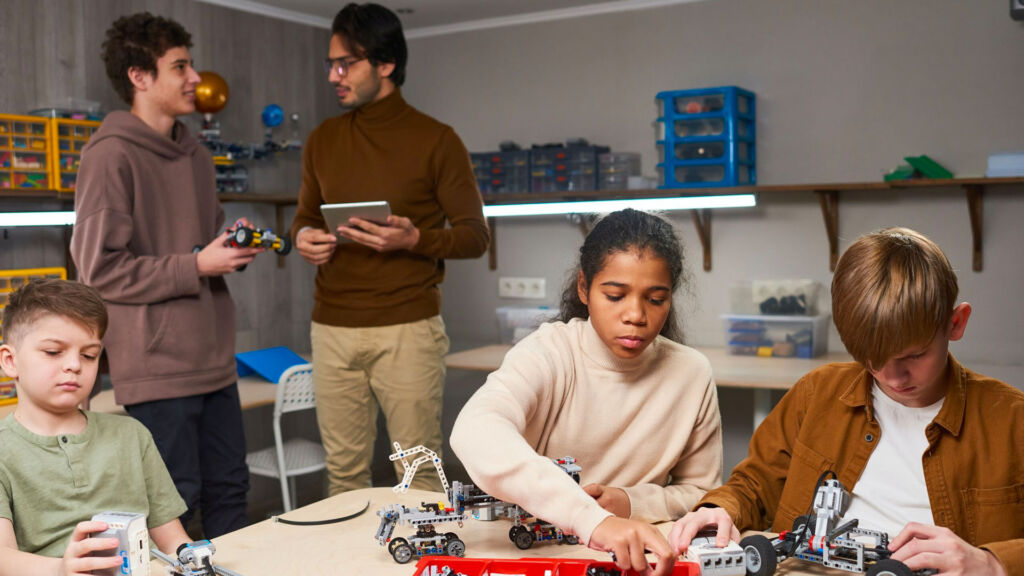 Students working on robots together.