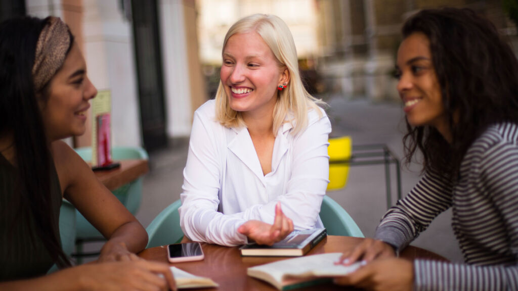 Counselor with two students.