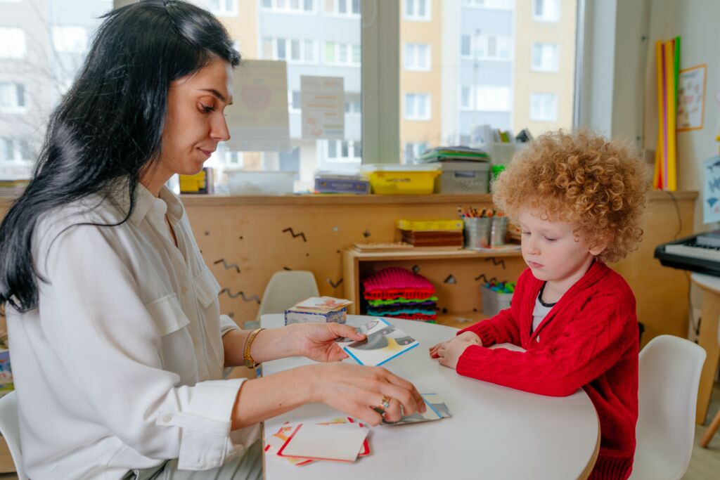 Teacher with a young student.