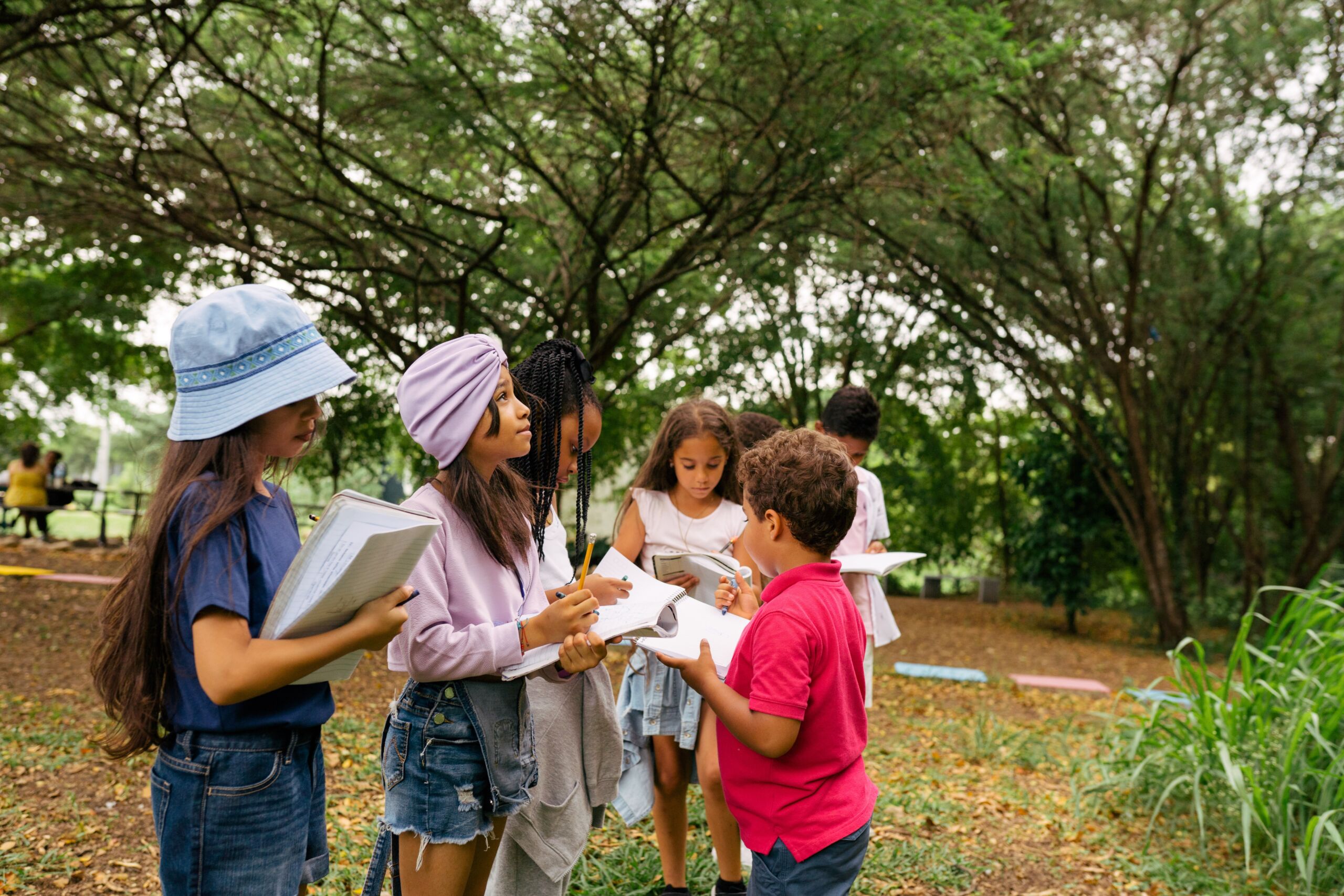 aug blog colette Students outside with books.