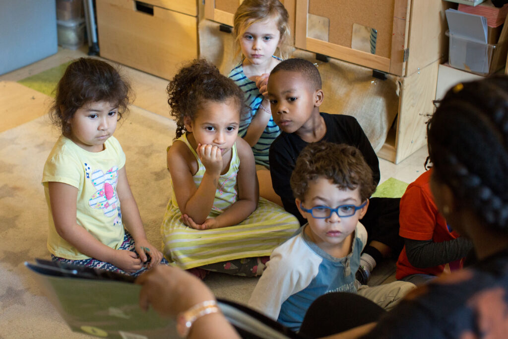 Preschoolers listening to a story.