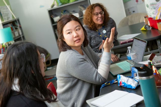 Teacher shares plans during a team meeting session.