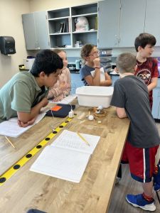 Students in a lab, working on STEM projects.