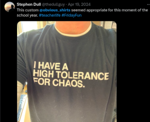 Twitter - Author wearing a shirt that says "I have a high tolerance for chaos."