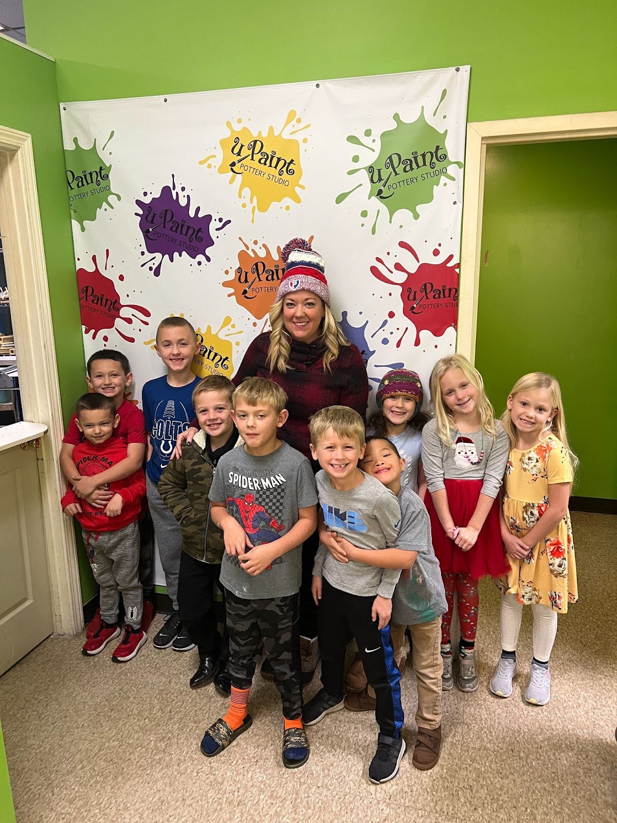 Students and teacher posing for a picture.