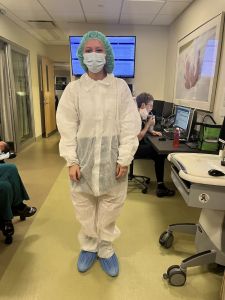 Student in biohazard gear.