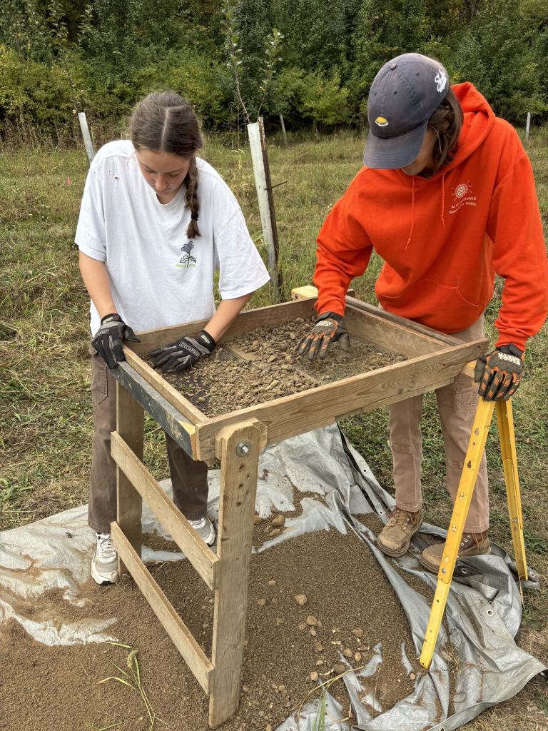 Students working on a construction project.