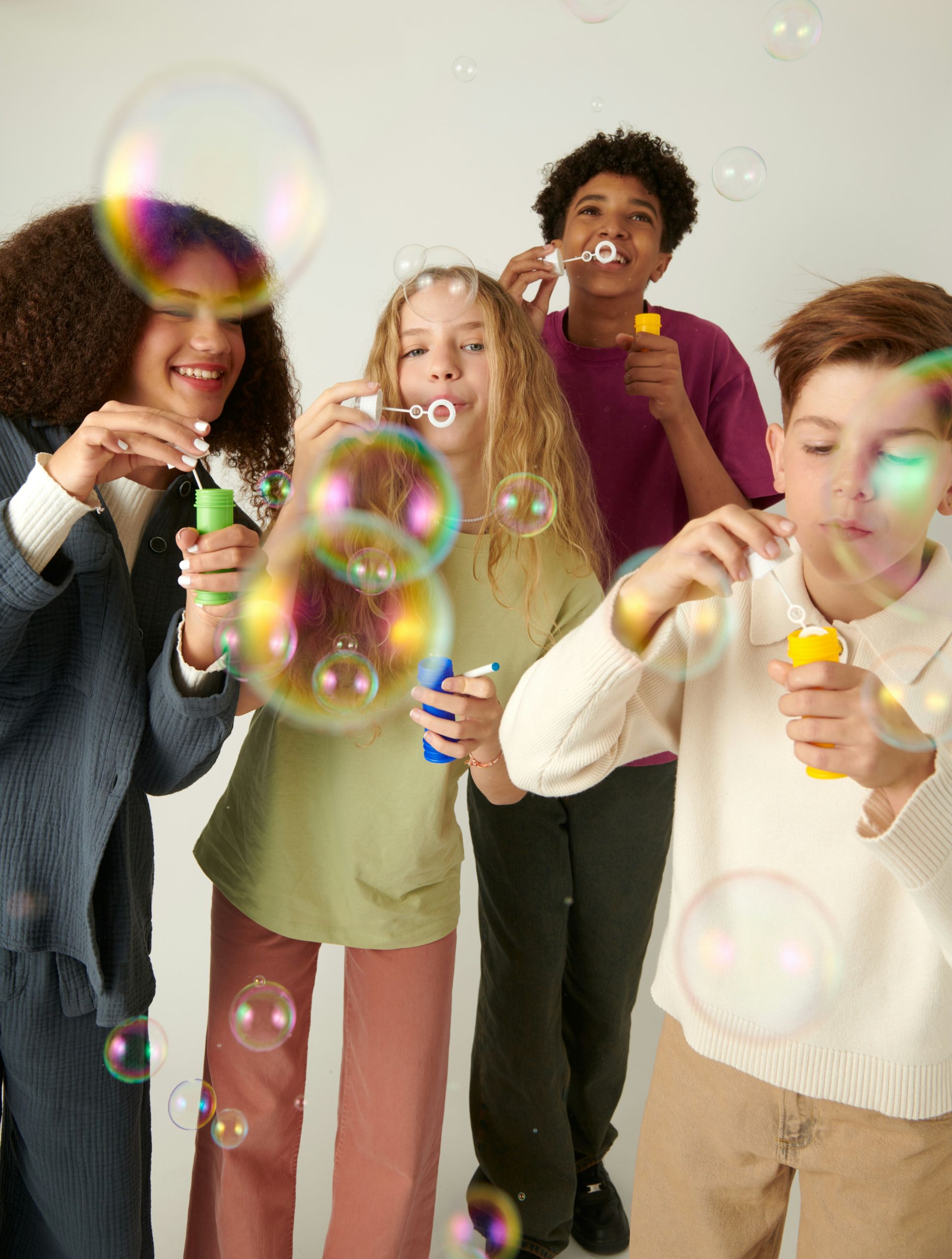 Students blowing bubbles.