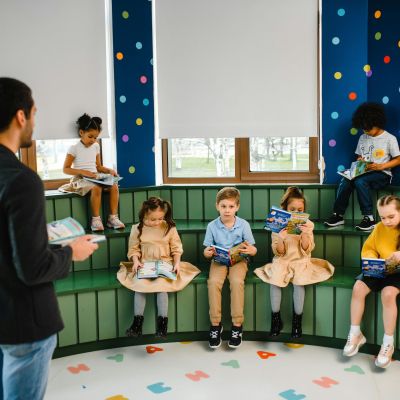 Reading in front of children.