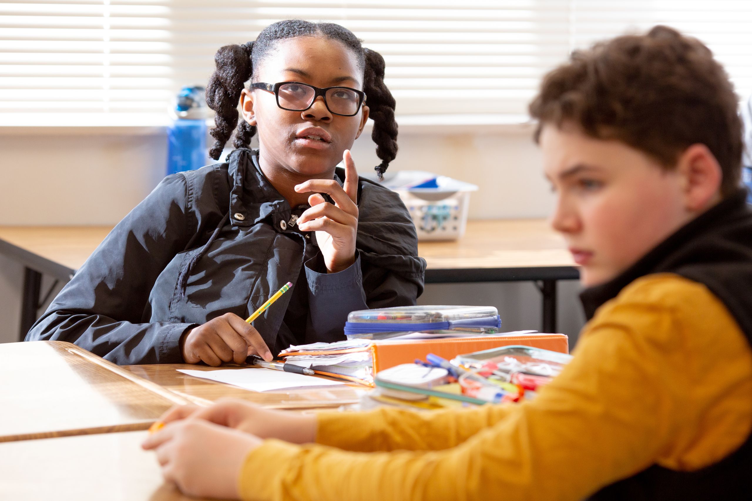 Sixth-grade girl thinking A sixth-grade student contemplates the meaning of her math lesson.
