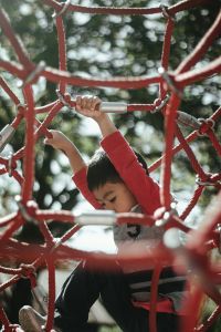 Child playing on a playground.