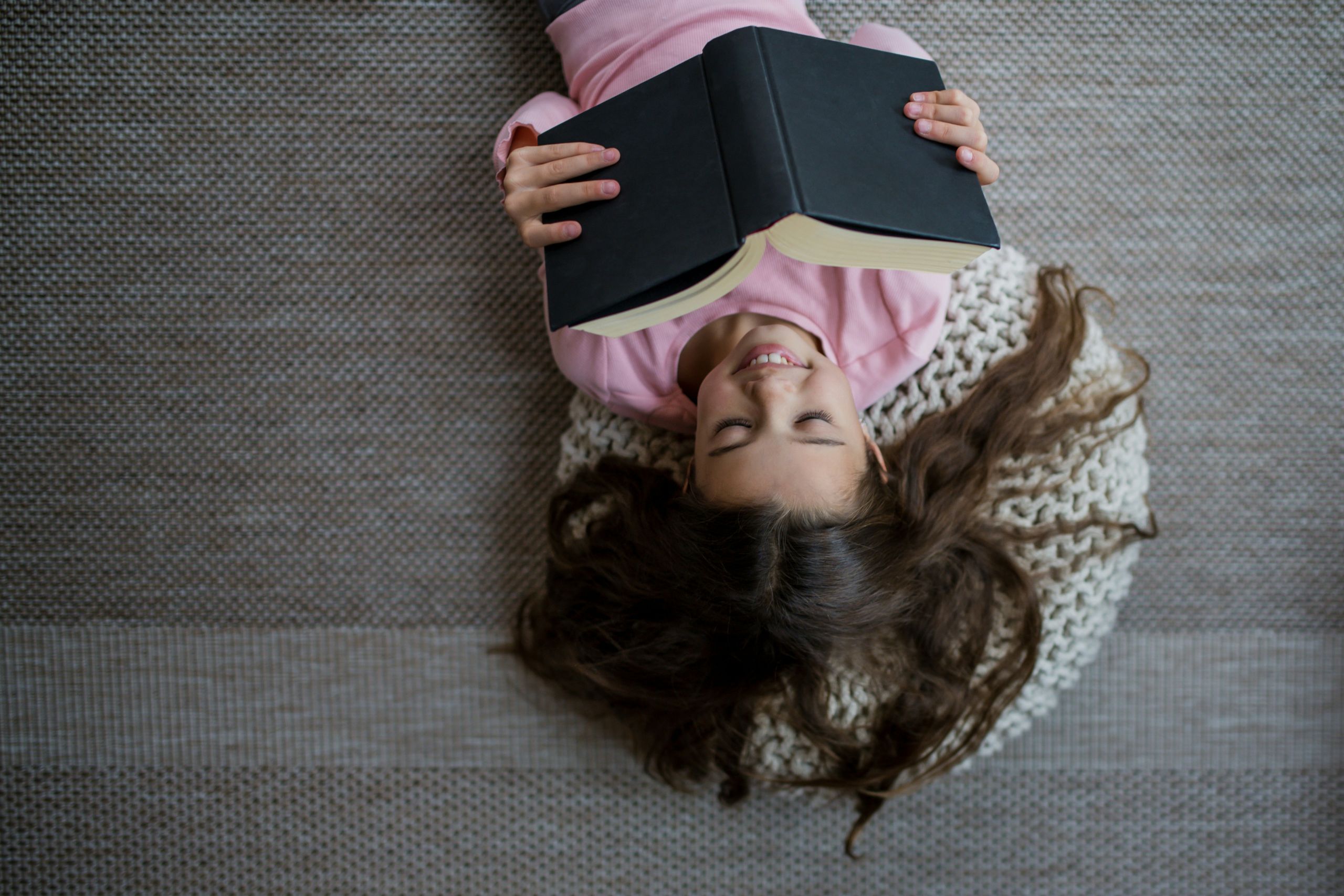 Child reading image by Getty Images for Unsplash+
