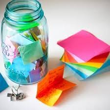 Jar full of sticky notes.