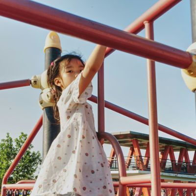 Child playing on a playground.