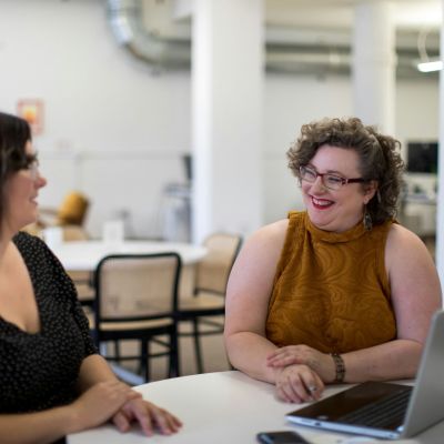 2 adult women talking