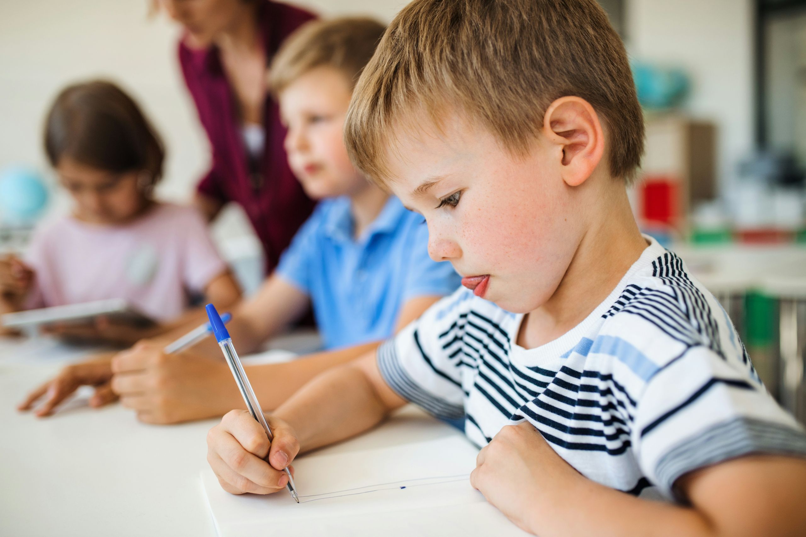 Elementary boy writing