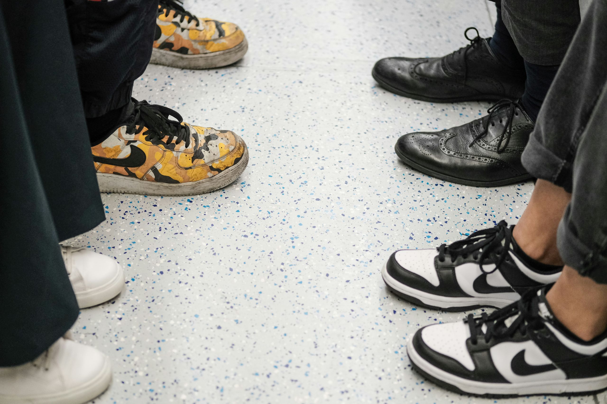 kevin-grieve-_T71dPGYWKA-unsplash 4 pair of shoes facing each other