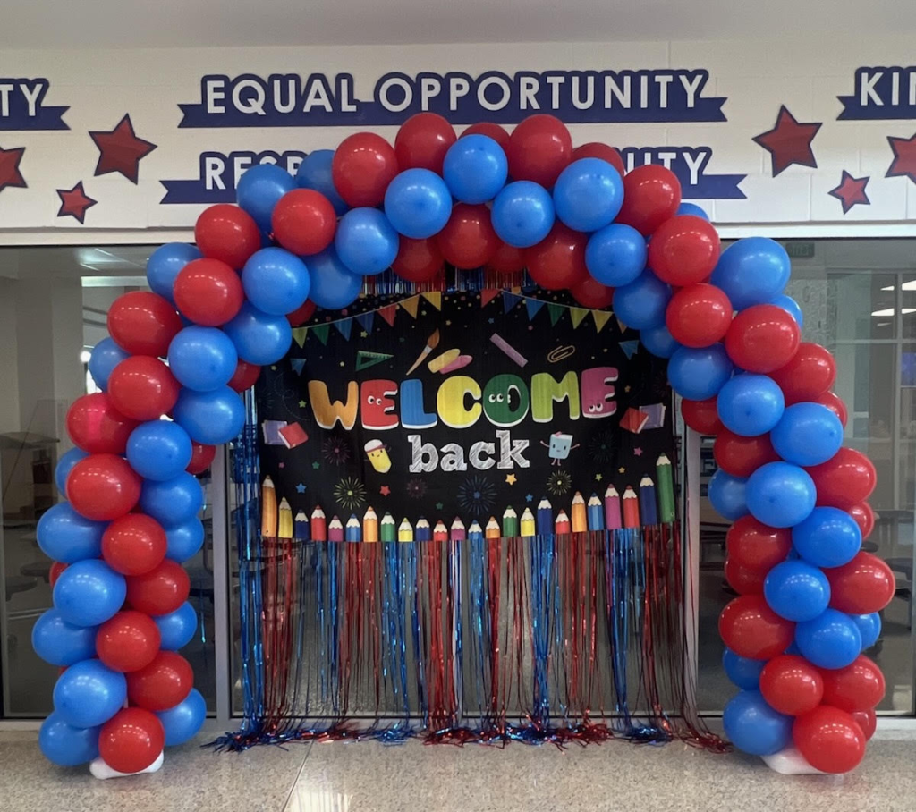 A red & blue balloon over a 